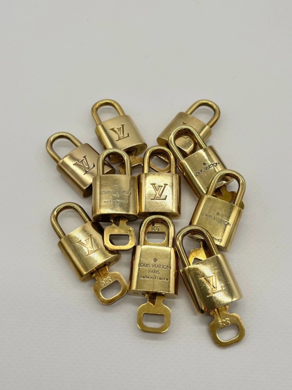 Authentic Louis Vuitton lock with key